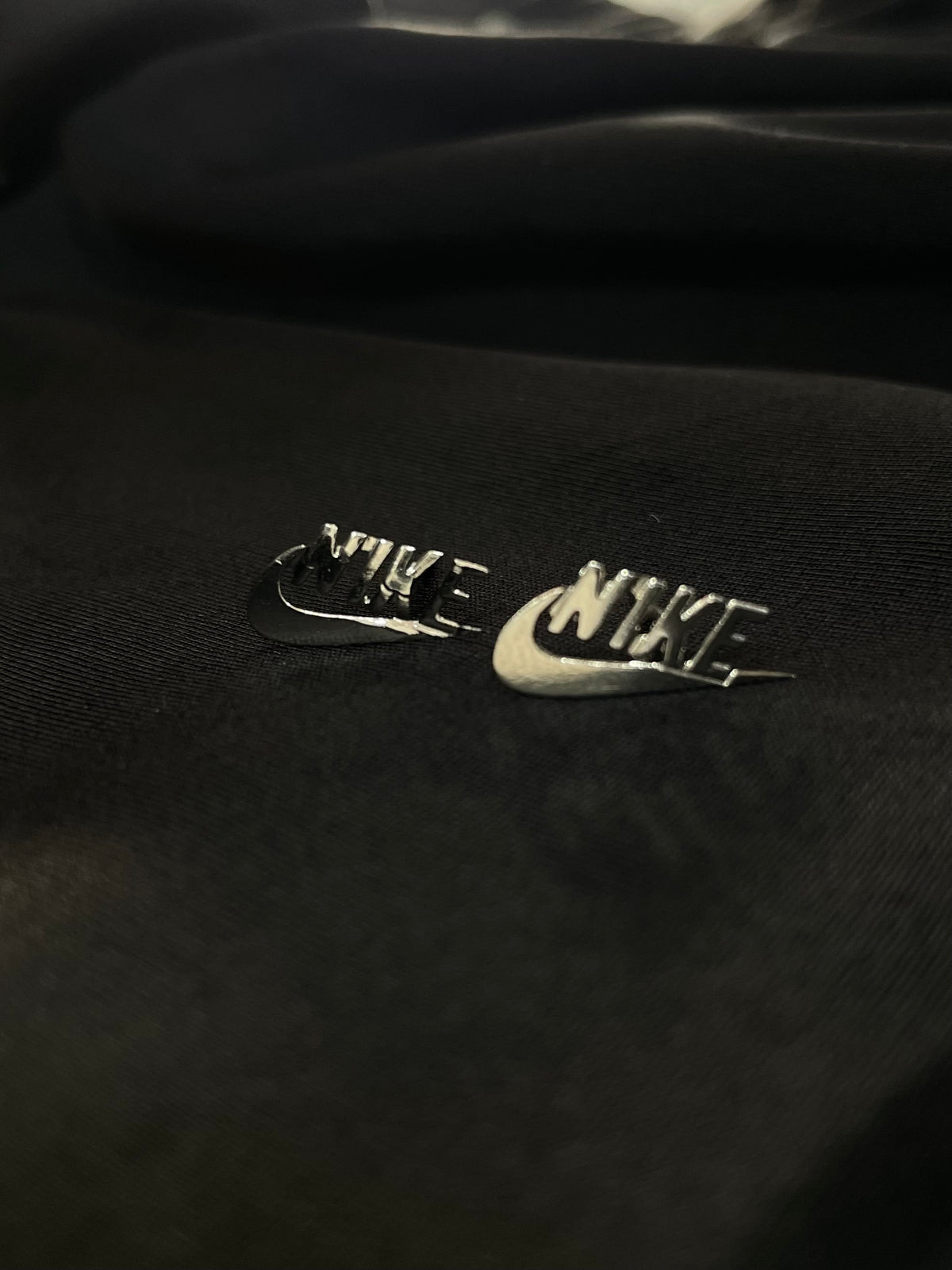 BRINCOS PRATA (NIKE)